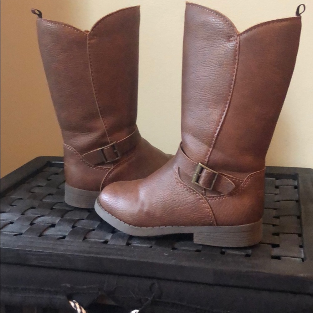 Tall light brown boots with buckle detail
